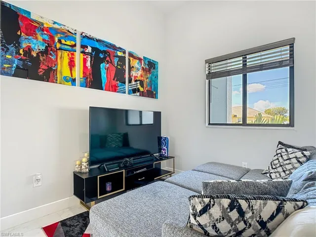 Bedroom featuring baseboards