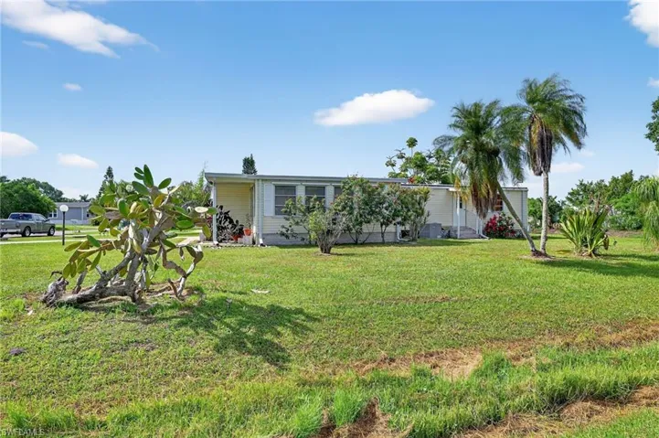 View of front of home featuring a front lawn
