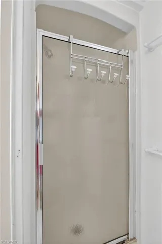 Bathroom featuring a shower stall