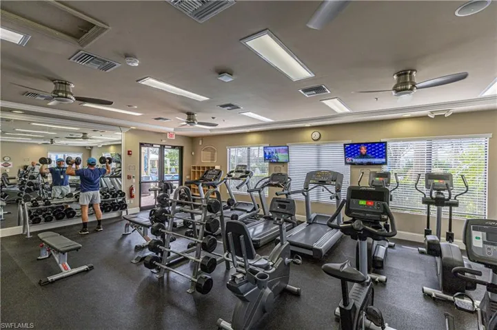 Gym featuring ceiling fan