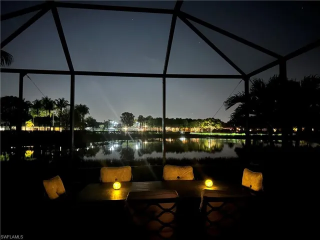 Sunroom with a water view