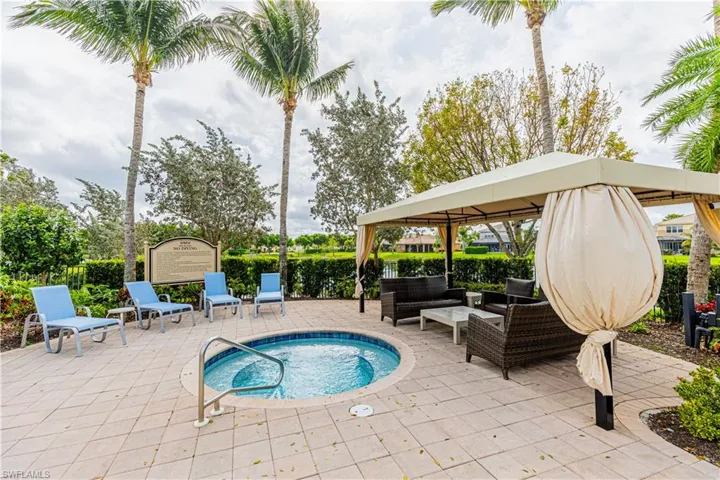 View of swimming pool with an outdoor living space, a patio, a gazebo, and a community hot tub
