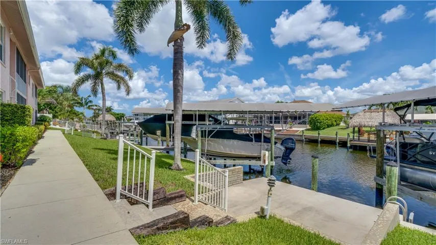 Dock area featuring  a water view