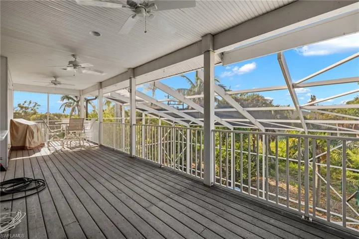 Wooden terrace with ceiling fan
