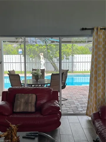 Living room overlooking the Lanai and Pool area