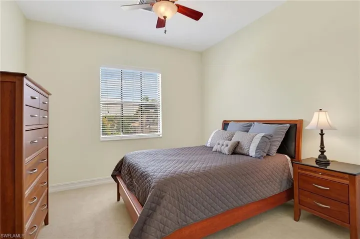 Upstairs Bedroom #1 with ceiling fan & light