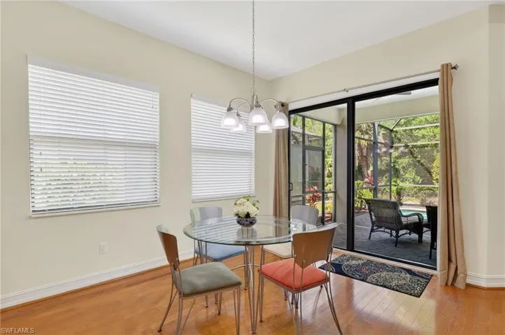 Dining Area looking out to pool and nature preserve