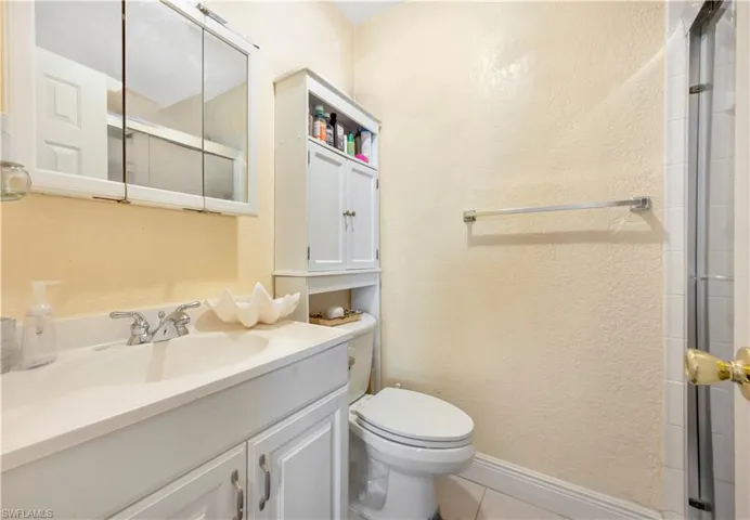 Bathroom with tile flooring