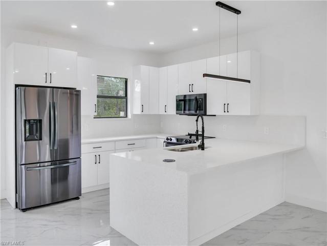 941 Alcutt ST, LEHIGH ACRES FL 33974