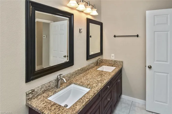 Bathroom with dual sinks and beautiful granite!