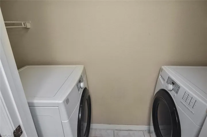 ...featuring front-loading washer & dryer.