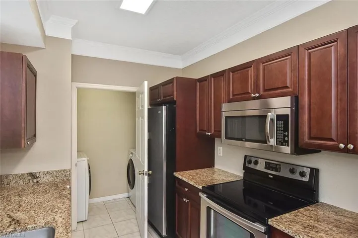 Laundry room is just off the kitchen....