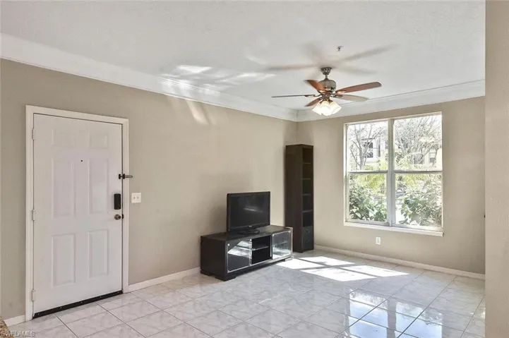 Sunlight pours through the large double windows, over 5 feet high!