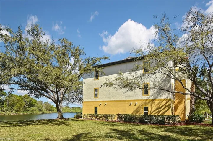 Sideview of 11520 with lake visible behind.