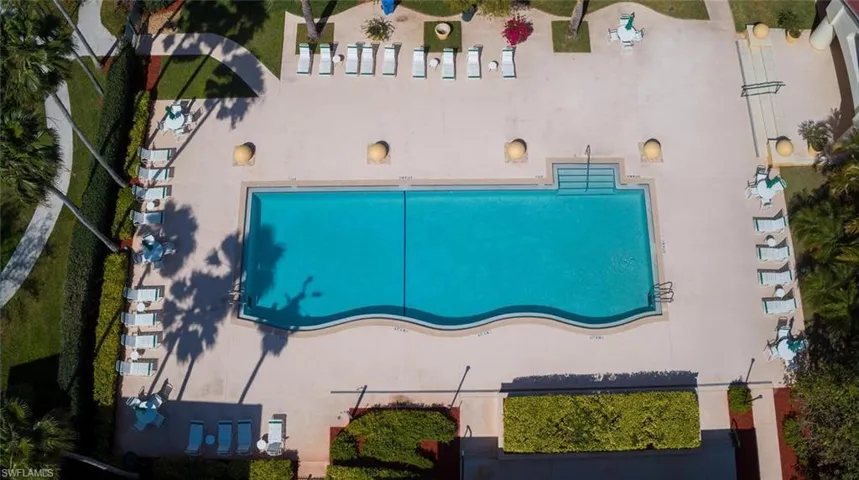 Gorgeous pool deck with lots of lounge chairs!