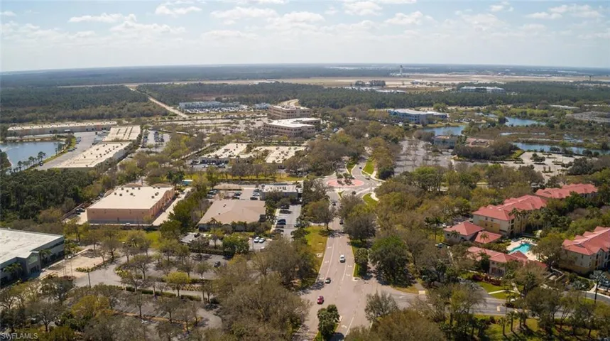 Looking south on Gateway Blvd., RSW Air Traffic Control Tower visible in the distance.