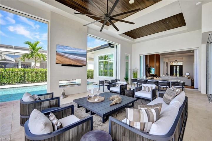 Outdoor Entertainment area  with dual sided  fireplace including a  sound system