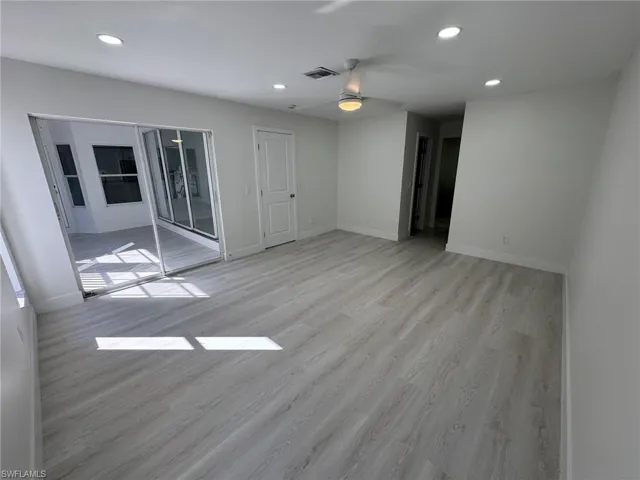Unfurnished living room featuring recessed lighting, light wood-type flooring, and ceiling fan