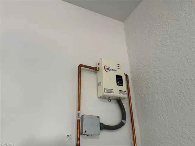 Detailed view of a textured wall and water heater