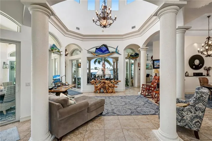 Building lobby with a towering ceiling and crown molding