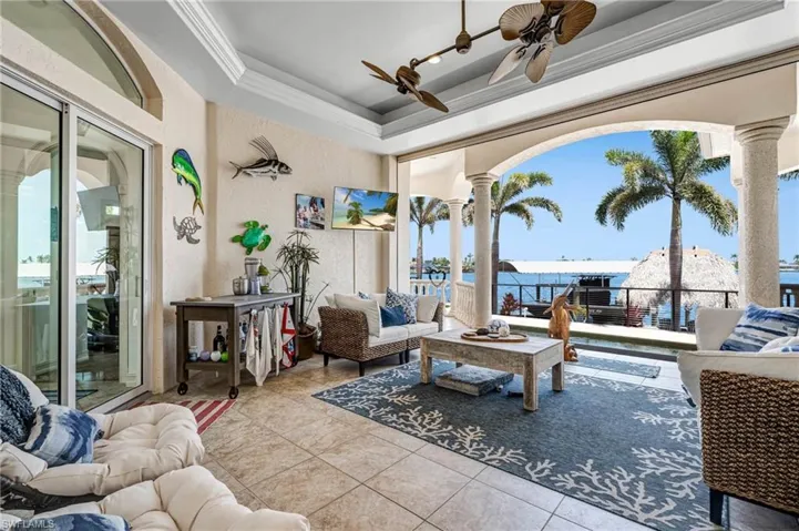 View of patio / terrace with an outdoor hangout area and ceiling fan
