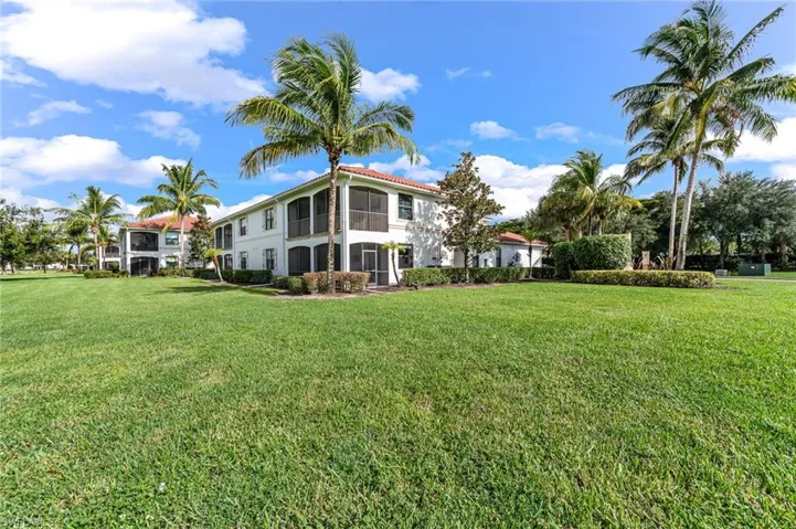 View of yard with a sunroom