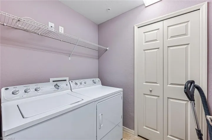 Clothes washing area with washer and dryer