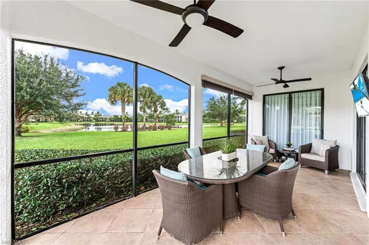 Sunroom featuring ceiling fan