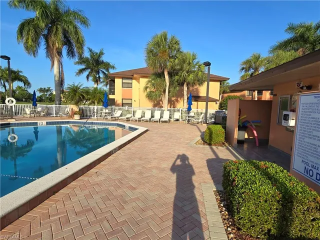 View of swimming pool featuring a patio