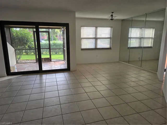 Living/Dining area featuring tile floors.