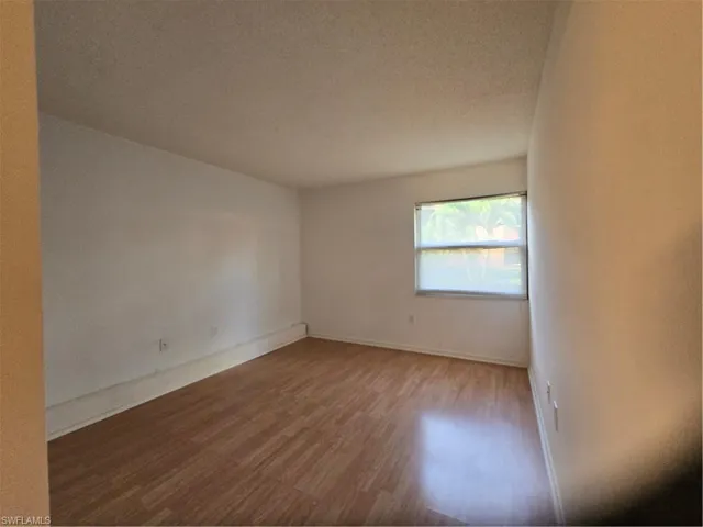 Master bedroom wood-style floors