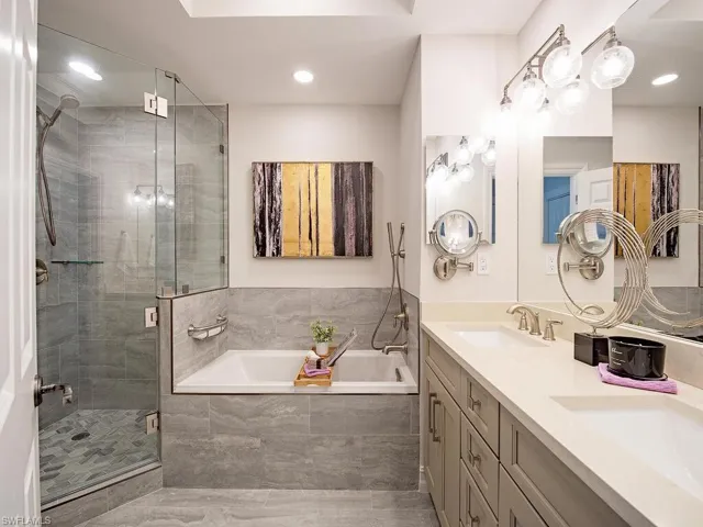 Bathroom with independent shower and bath and vanity