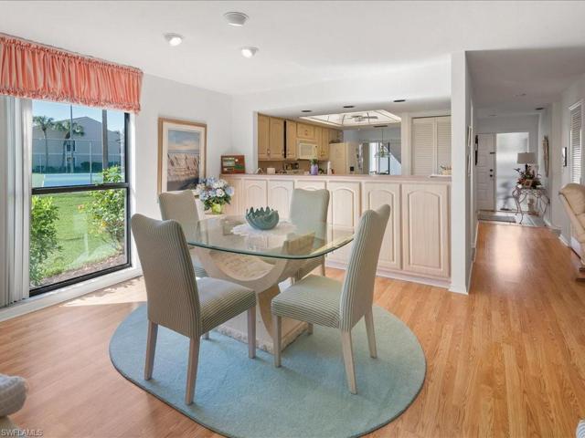 Beautiful wood floors grace the LR, DR and the den.