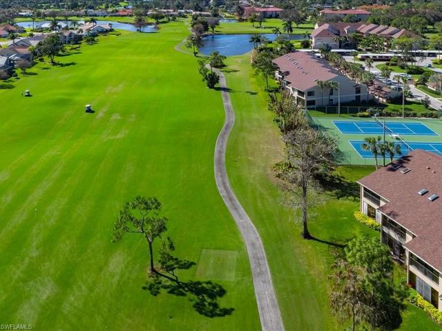 Lush golf course and water views.