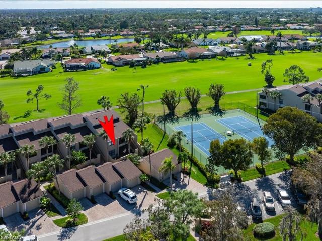 Sun drenched 2BR 2BA +den end unit overlooks 9th hole on the Silver Course.