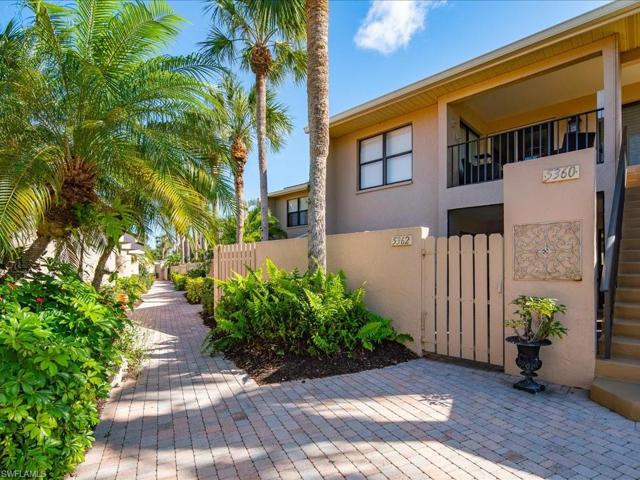 Paver walkways and driveways run the whole length of the street.
