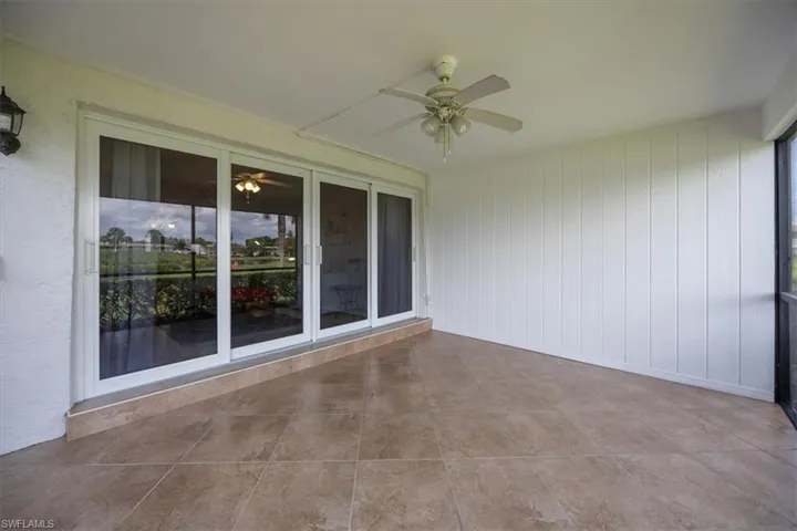 View of patio featuring ceiling fan