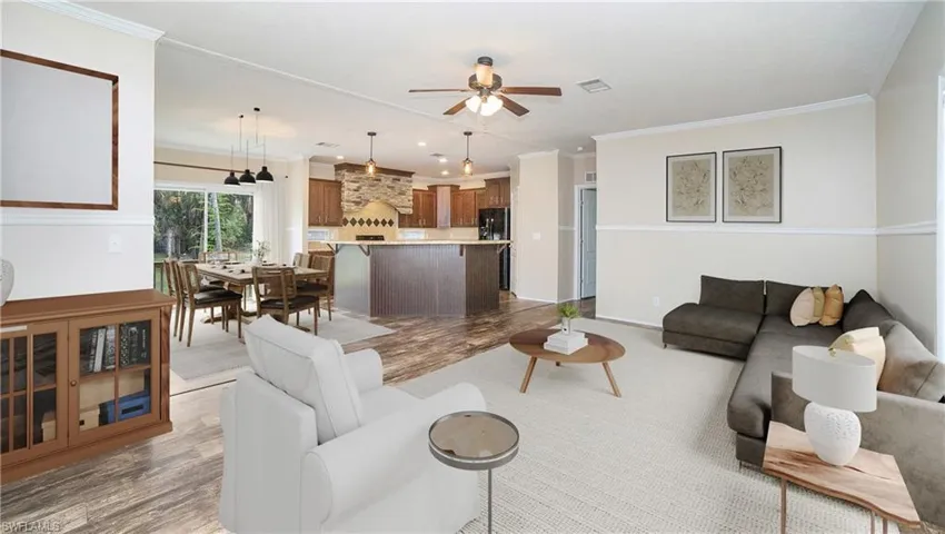 Photo includes reality staging to showcase the possibility of the living room. Design services included with purchase!