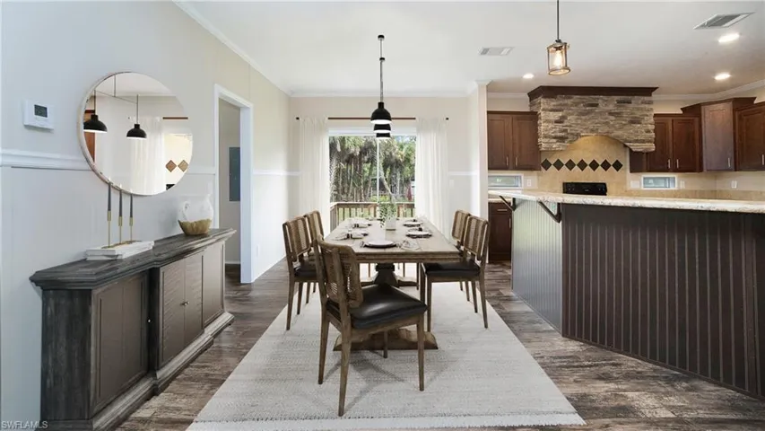 Photo includes reality staging to showcase the possibility of the dining room. Design services included with purchase!