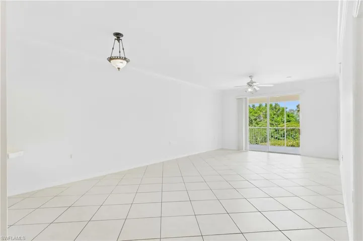 Open and airy living room featuring peaceful preserve views and plenty of room to relax.