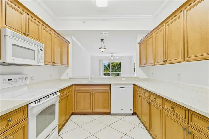 Functional kitchen featuring ample cabinetry and a practical layout for everyday use.