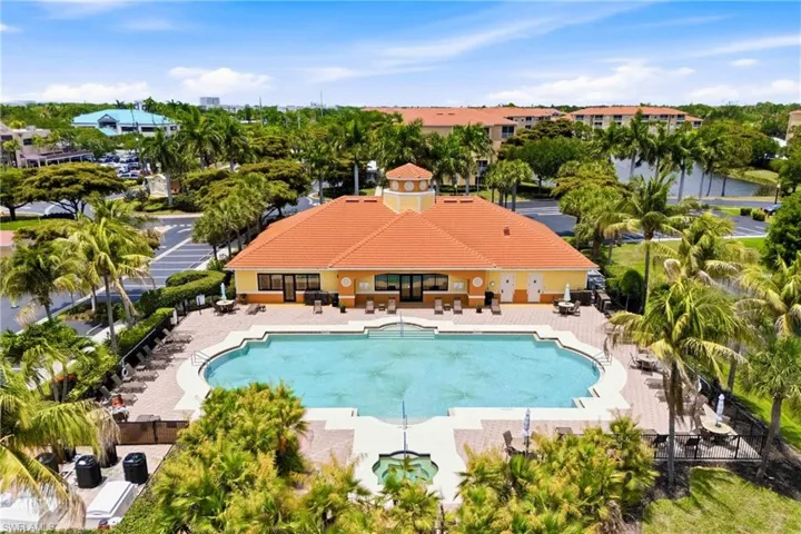 Pool and clubhouse area, showcasing resort-style amenities designed for relaxation and enjoyment.