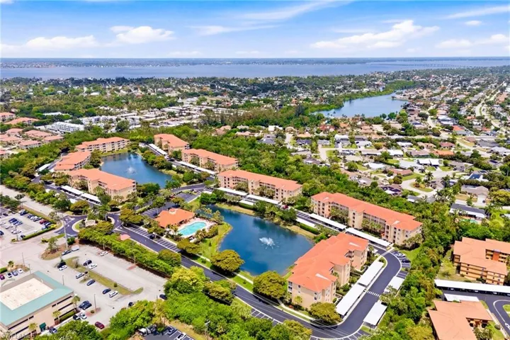 Scenic overhead view of the property and surrounding neighborhood, reflecting a quiet Florida lifestyle.