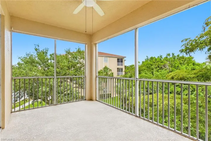 Comfortable balcony perfect for morning coffee, evening unwind, or simply enjoying the Florida breeze.