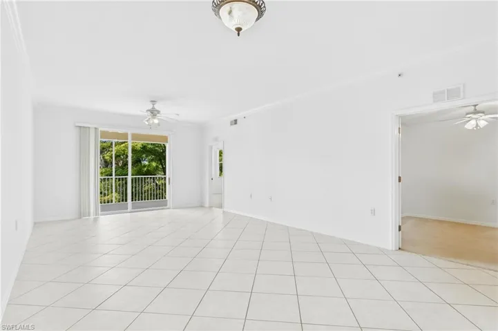 Bright and spacious living room filled with natural light and designed for everyday comfort.
