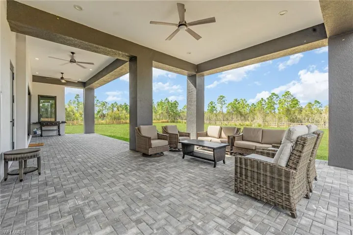View of patio / terrace with a ceiling fan