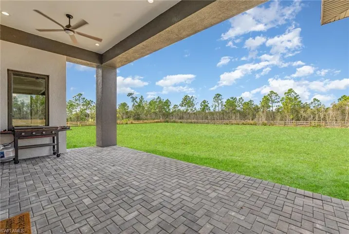 View of patio with ceiling fan