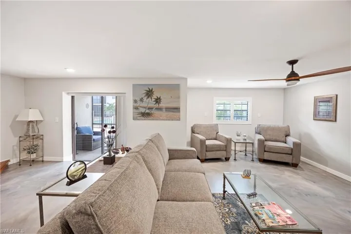 Living room featuring ceiling fan
