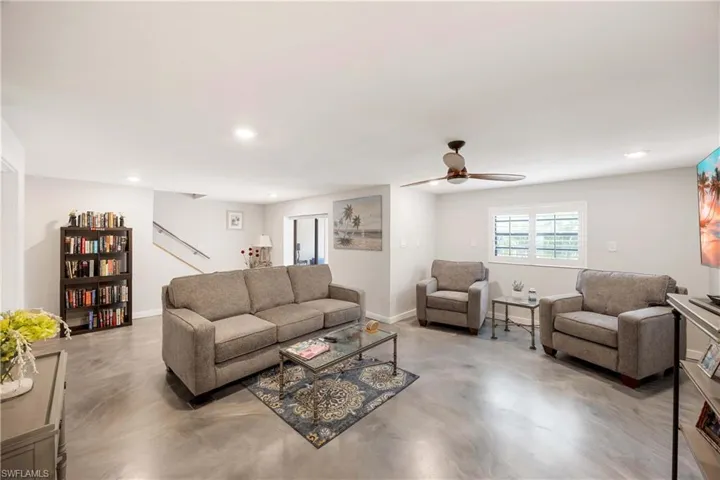 Living room featuring ceiling fan