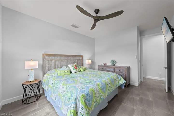 Recessed lighting and ceiling fan overhead